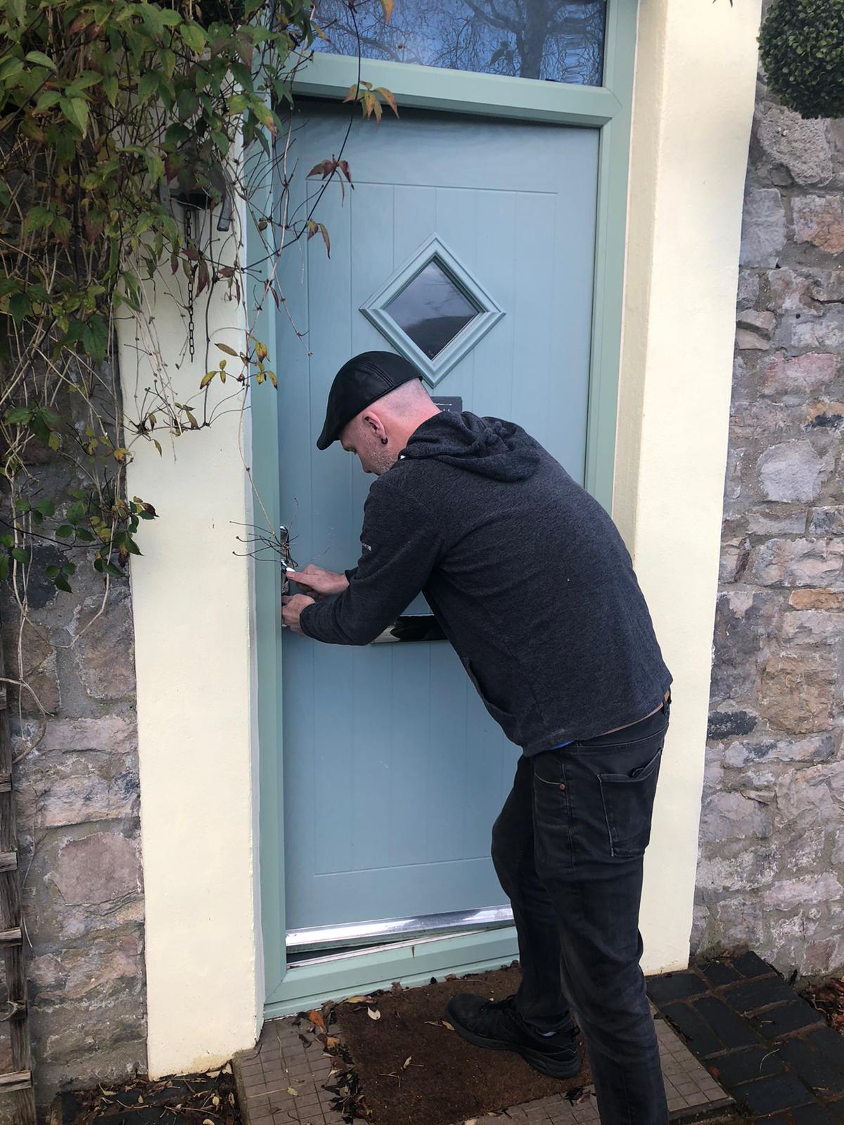 Opening the door of Steepfield House of the first time